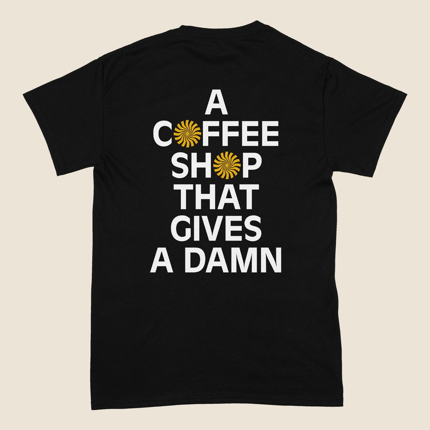 "A COFFEE SHOP THAT GIVES A DAMN" Heavyweight T Shirt